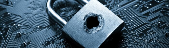 Broken lock showing security is breached.